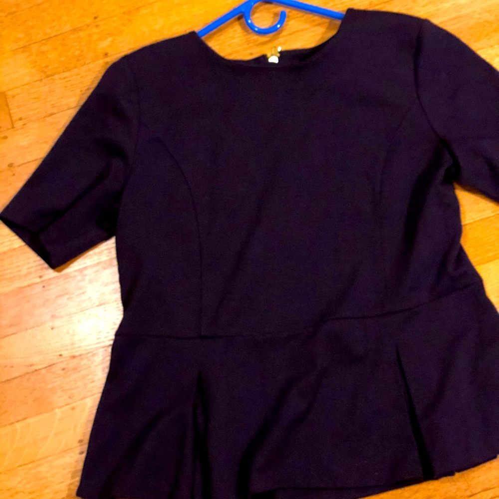 Talbots petite peplum top on dark blue